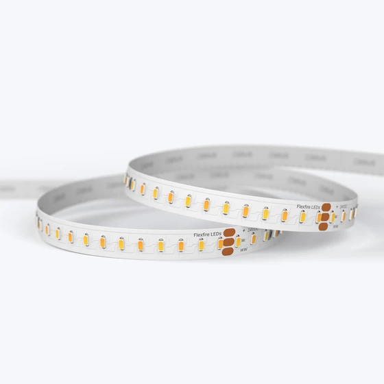 A coiled UltraBright™ Architectural Dynamic Tunable White IP20 LED Strip showing the high-density PCB and 3M backing.
