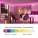 Living and dining room with ColorBright™ RGB + Dynamic Tunable White cove lighting showing adjustable hues and tuning range.