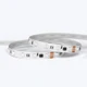 A coiled ColorBright™ RGB Digital Pixel IP20 LED Strip showing the high-density circuit board and 3M adhesive backing.