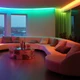 Curved ceiling cove in a living room lit with gradient color transitions from the ColorBright™ RGB Digital Pixel IP20 LED Strip.