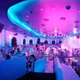 Fancy nightclub interior with blue and pink ceiling cove lighting using a ColorBright™ RGB 600 IP20 LED Strip.
