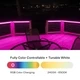 ColorBright™ RGB + Tunable White IP65 LED Strip Light glowing in various hues along a deck railing, with a color control bar.