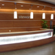 Modern reception desk lighting using LED light sheets