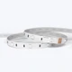 A coiled ColorBright™ RGB 150 IP20 LED Strip showing the high-quality circuit board and 3M adhesive backing.