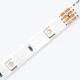 High-resolution, diagonal close-up shot of the ColorBright™ RGB 150 IP20 LED Strip showing precise solder points.