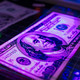 USD dollar under UV light