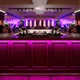 Commercial bar counter illuminated with pink and magenta accent lighting using a ColorBright™ RGB 300 IP20 LED Strip.