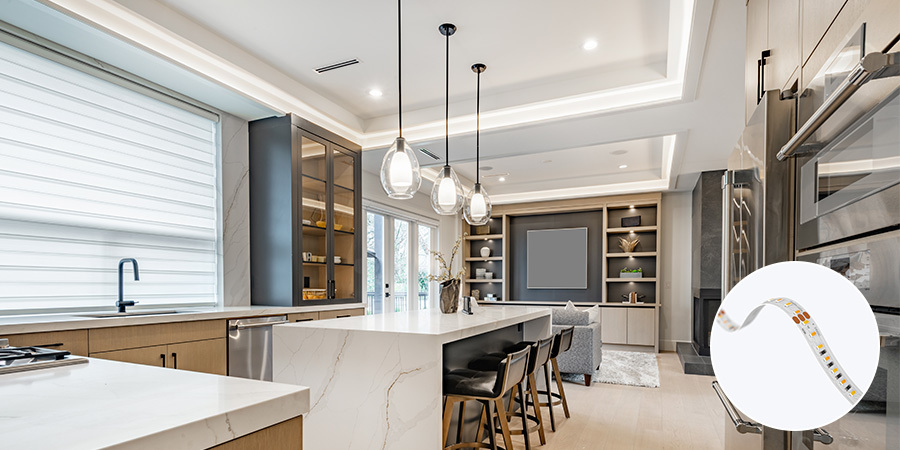 Elegant contemporary kitchen and living space illuminated with Flexfire LEDs, featuring recessed ceiling and under-cabinet lighting for a refined look.