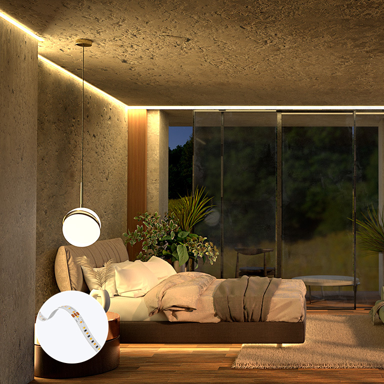 Warm cove LED strips accenting a modern bedroom ceiling