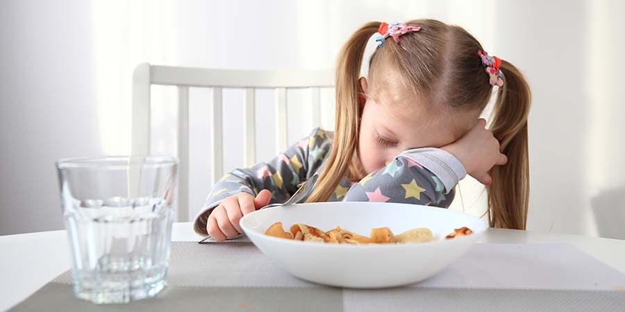 Child Falling Asleep During Breakfast