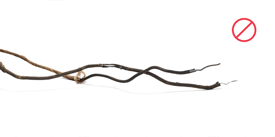 Frayed, damaged electrical wires with a red “no” symbol