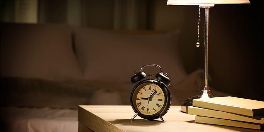 Warm bedside LED lamp casting a cozy nighttime glow