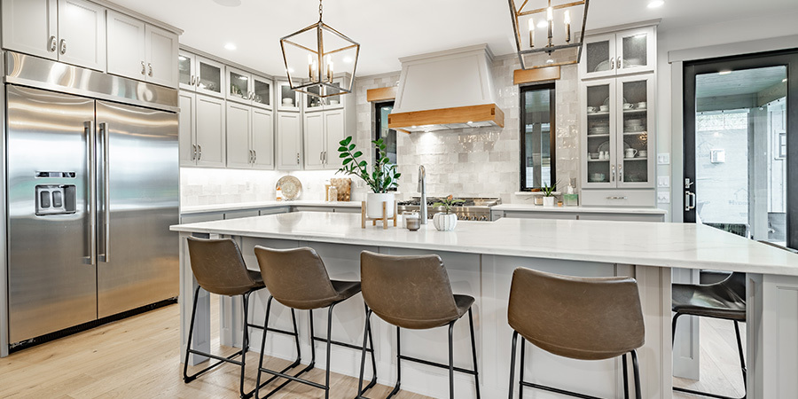 Bright modern kitchen featuring under-cabinet and accent lighting illuminated by Flexfire LEDs for a warm, inviting atmosphere.