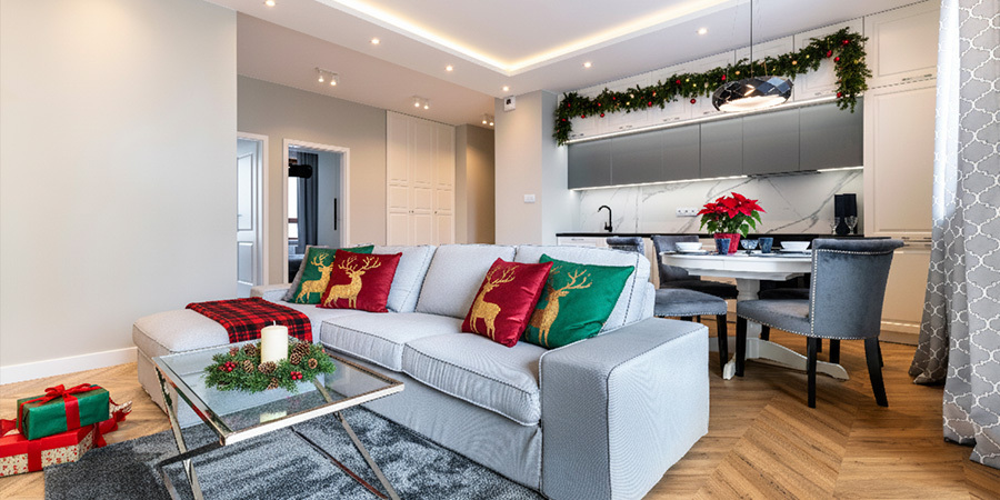 Kitchen and living room with LED lighting under cabinet and cove