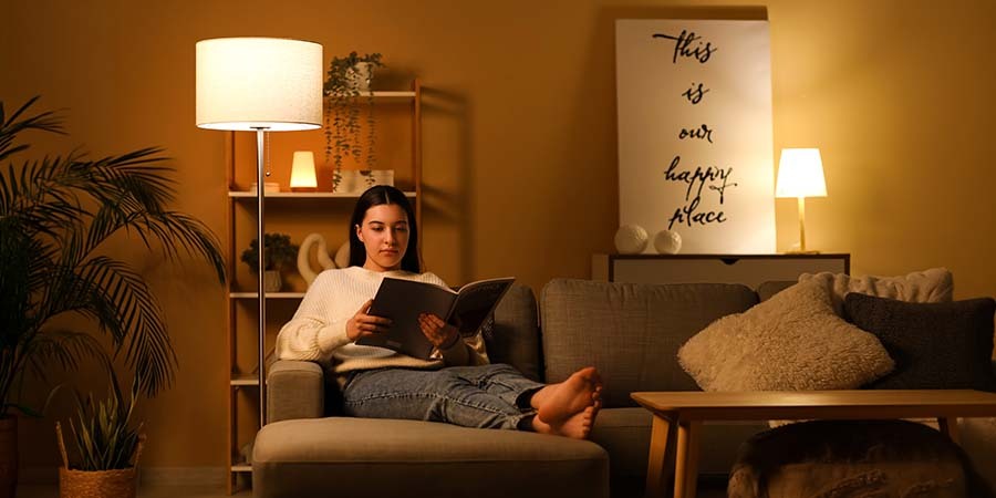 Person Reading Book Living Room Task Lighting