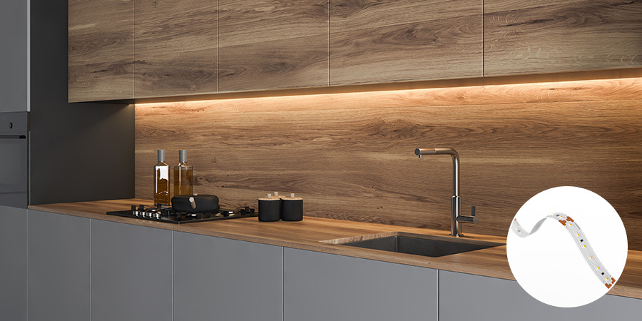 Modern kitchen with warm under-cabinet lighting powered by Flexfire LEDs, showcasing sleek design and high-quality LED strip performance.