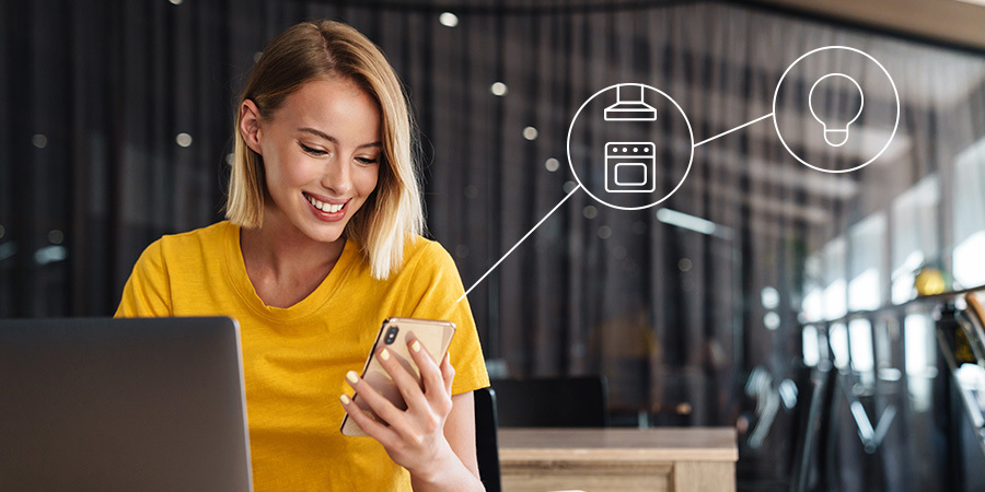 Person using smartphone to control lights