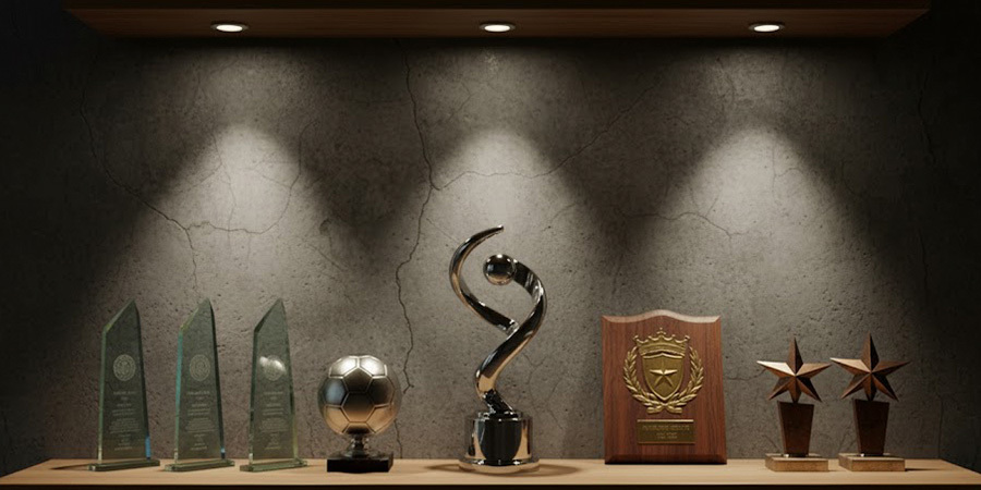 Trophies under spot lighting