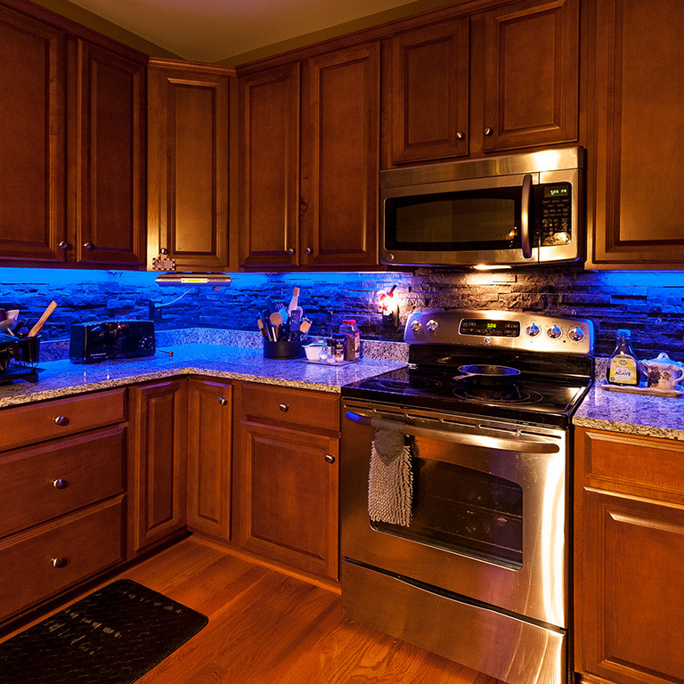 Blue undercabinet LED kitchen lighting