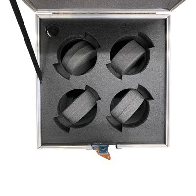 Charcoal foam insert cut for four lenses