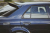 URAS Roof Spoiler (99-02 R34)