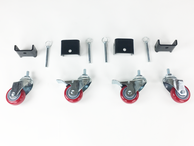 The EZ-Haul Casters Kit parts including four heavy-duty red swivel casters with brakes, four black mounting brackets, and four hitch pins for installation