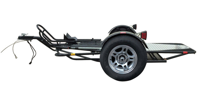 Alpha Sport motorcycle trailer with loaded bike and front wheel chock
