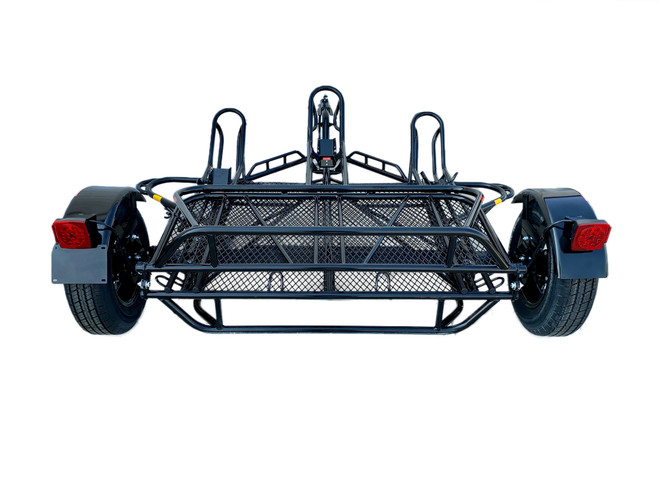 Rear view of Freestyle dirt bike trailer in folded position, illustrating compact storage design.