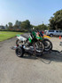 Trinity MT3 3 Rail Motorcycle Trailer – black powder-coated three-rail trailer with integrated ramp