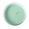 An overhead, top-down view of the unlit candle, showing the wood wick centered in the smooth, light green soy wax.