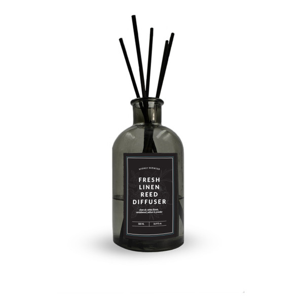 A clear, isolated product shot of the Fresh Linen reed diffuser against a plain white background, highlighting the sleek dark gray bottle, black label, and tall black reeds. A clear, isolated product shot of the Fresh Linen reed diffuser against a plain white background, highlighting the sleek dark gray bottle, black label, and tall black reeds.