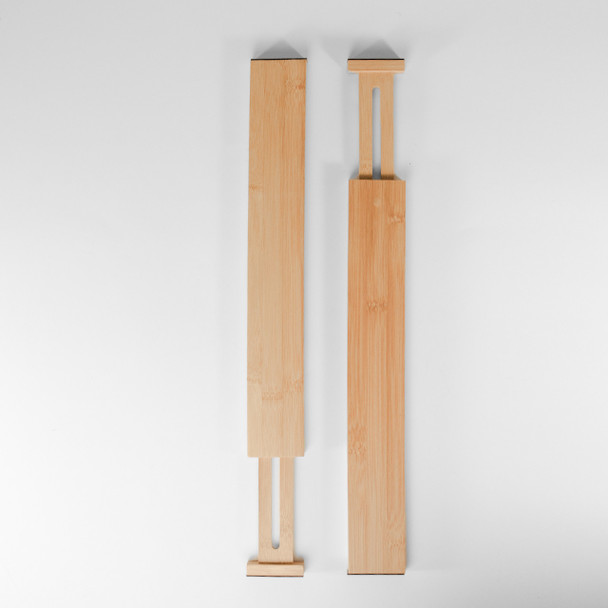 The set of two bamboo drawer dividers are displayed against a white background, with one divider fully compressed and the other fully expanded to demonstrate their adjustable length.