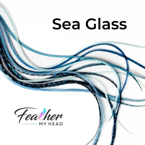 Real Feather Hair Extensions in several shades of Blue. Sourced only from the USA these Heat Resistant Hair Feathers can also be washed, blow-dried, curled, and straighten. The Bulk Salon Pack of Premium Salon Hair Feathers in our Sea Grass Collection is available in short and long lengths.