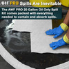 Person wearing blue gloves using white absorbent pads and a sock to contain and clean up an oil spill on a floor.
