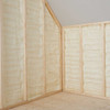 Spray foam insulation applied between wooden wall studs in an unfinished attic space to seal and insulate walls.vvvv