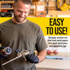 Contractor attaching a foam sealant canister to the basket adapter of a metal applicator gun.