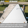 A person uses a roller to apply UV-resistant coating to a recreational vehicle roof for long-term weather protection.