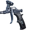 Close-up view of the metallic body, trigger, canister basket, and black handle on a dark grey spray foam gun.