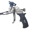 Close-up view of the metallic body, trigger, flow control knob, and black handle on a silver spray foam gun.