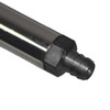 Close-up view of the black nozzle tip on a silver spray foam gun barrel.