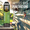 a can of Great Stuff Pro Pestblock foam sealant is shown outdoors near a spider web to demonstrate its use in sealing home penetrations against pests.