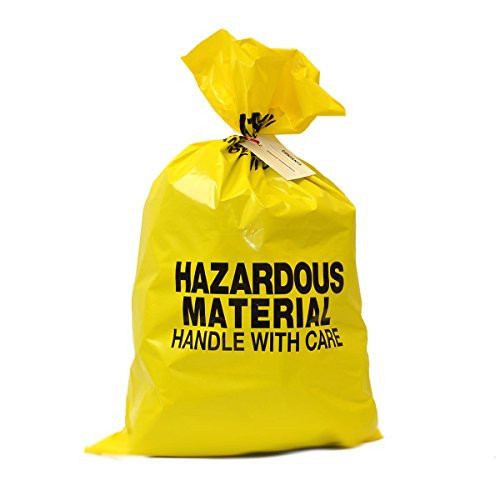 Large yellow hazardous material bag with a tie closure and content tag for waste disposal.