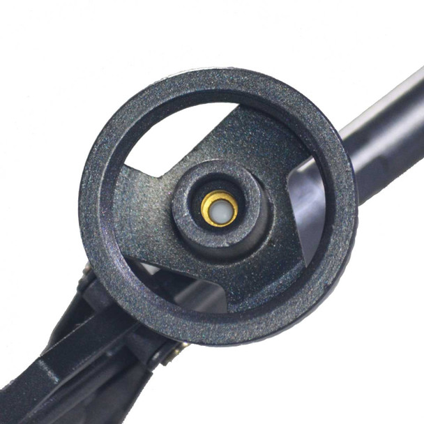 Top-down view of the circular threaded canister adapter ring on a dark grey spray foam gun.