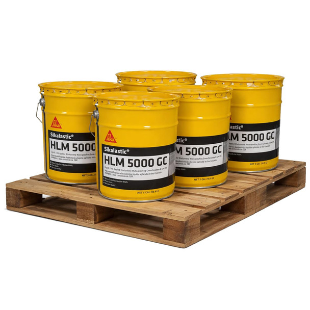 Five yellow 5 gallon pails of liquid-applied elastomeric waterproofing membrane arranged on a wooden pallet.