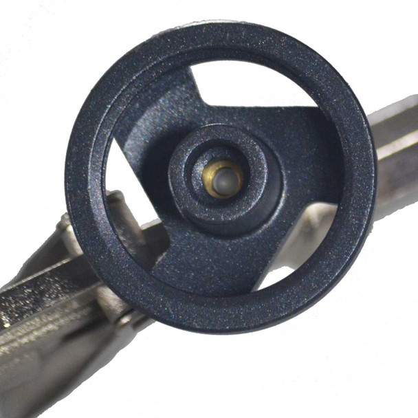 Top-down view of the dark grey circular canister adapter ring on a silver spray foam gun.