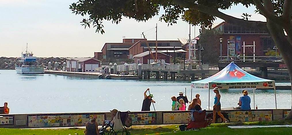 providing mini paddleboard clinic at Baby Beach