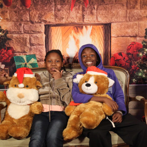 Local children receive Christmas gifts purchased with funds donated to Oasis of Hollywood.