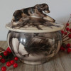 Black and White Dog Urn with sculpted dog on the lid of the urn. Hand crafted in the United States. Unique dog urn with dog on lid