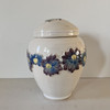Tall porcelain urn with blue and purple flowers