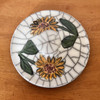 The lid of the small sunflower urn with hand painted smaller flowers.